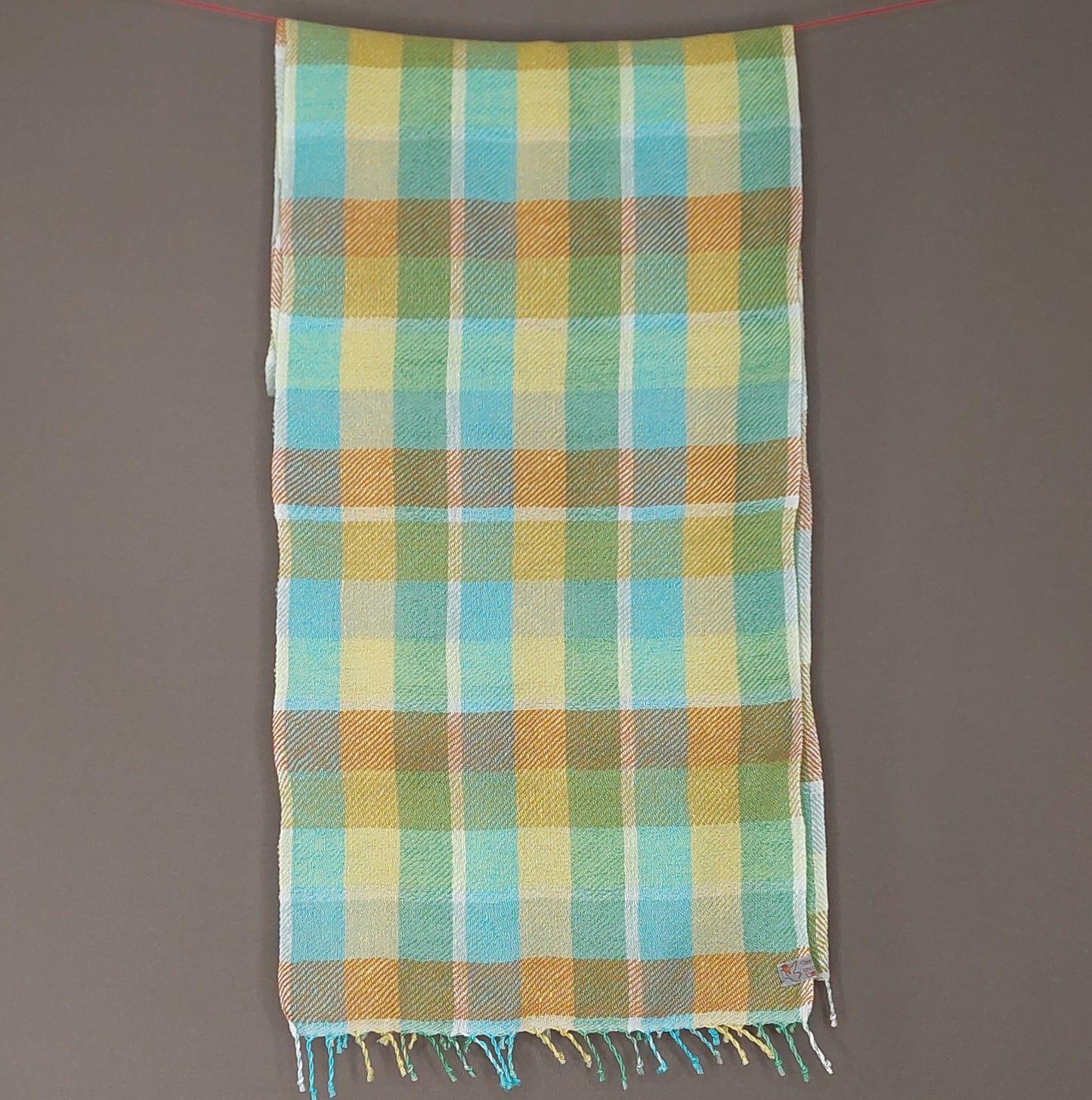 Leinenmerinoschal Grün Gelb Blau kariert mit Orange und Messing